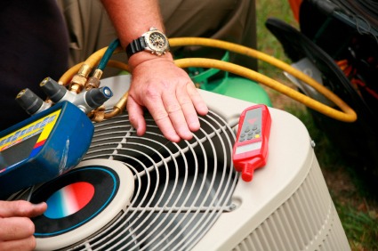 Technician troubleshooting a heating and air conditioning issue